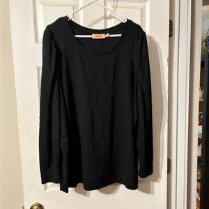 Black long sleeve Evri top with raised print.